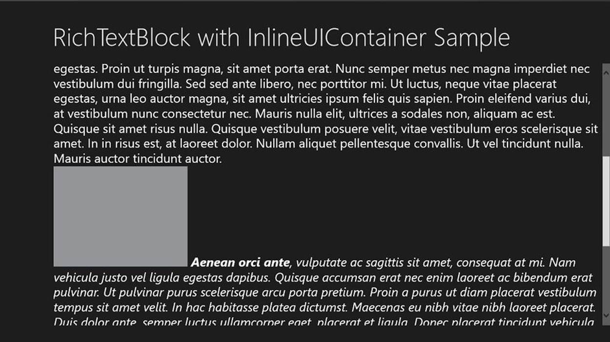 A screenshot of a Windows Store app showing two paragraphs with a gray rectangle between the paragraphs. The first three words in the second paragraph are displayed in bold and italics; the rest of the second paragraph is in italics only.