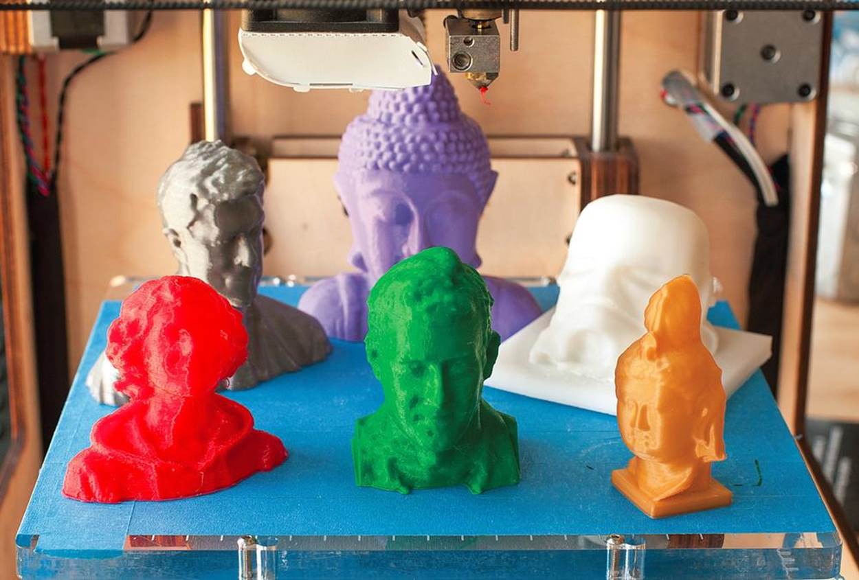 A build plate full of heads