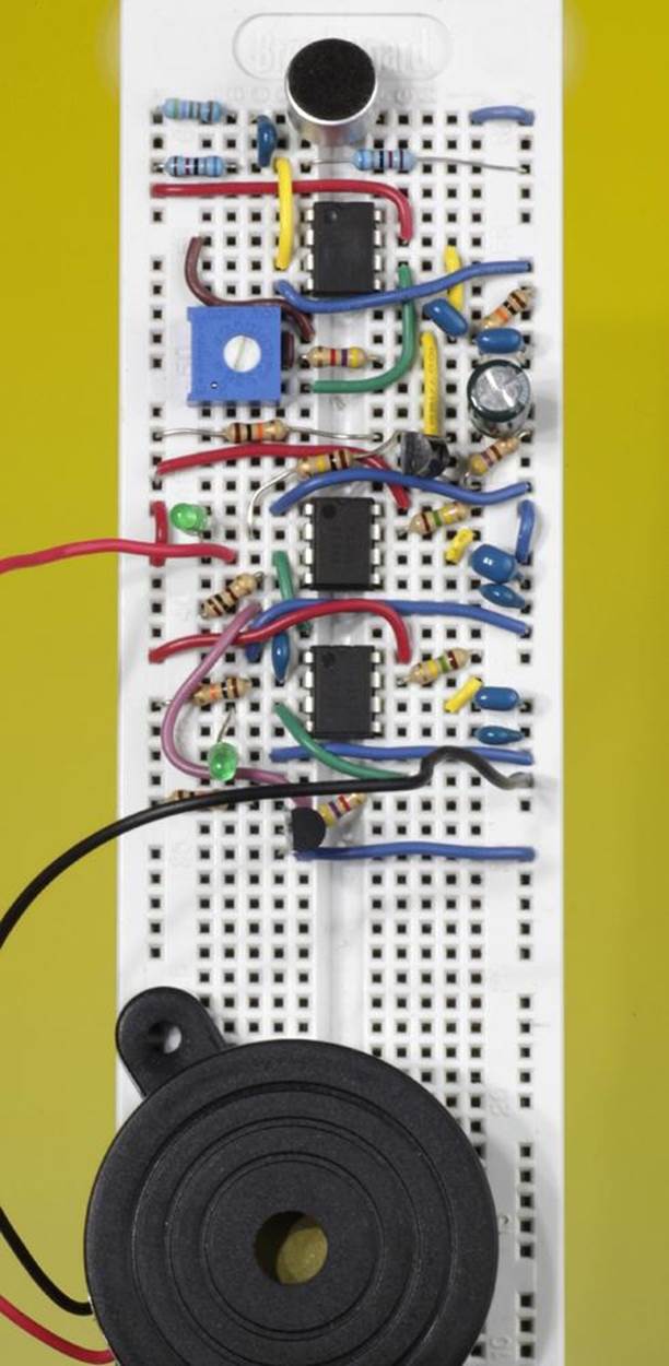 The final Noise Protest Device. The large round object is a heavy-duty beeper. The circuit will run for a limited time from a 9V battery.