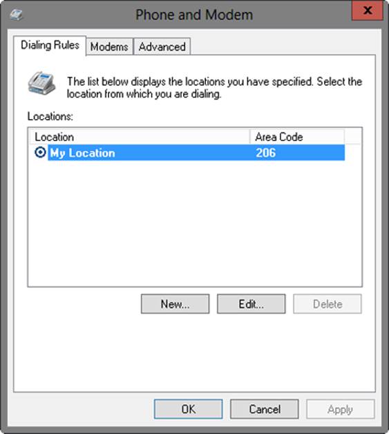 A screen shot of the Phone And Modem dialog box, showing locations configured for the computer by name and area code on the Dialing Rules tab.