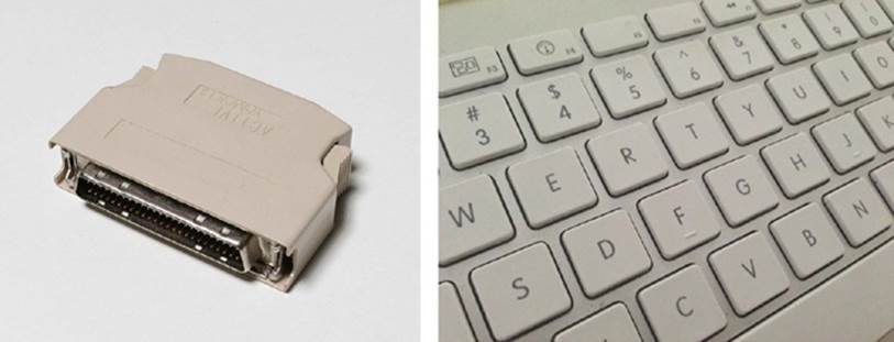 Left: A “terminator” for a Small Computer System Interface, or SCSI (pronounced “scuzzy”), device chain;Wikimedia Commons right: a keyboard for the structured-language input from human fingersPhoto by author.